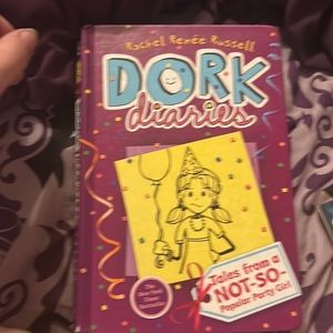 It’s just a regular, dork, diaries book. Practically  untouched.